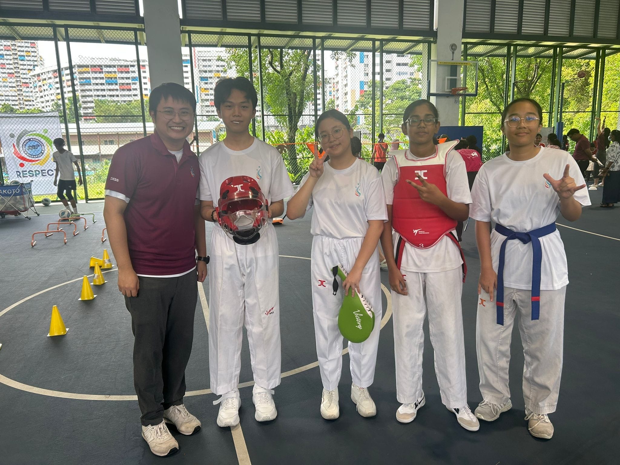 Students and teachers from Taekwondo advertise their cca